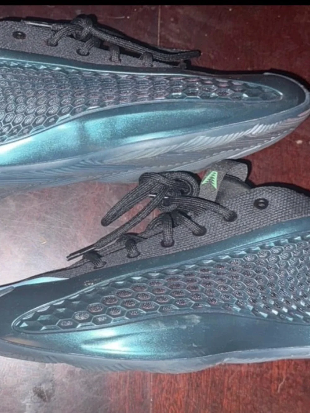 adidas Men's Black Sneaker with Iridescent Teal Accent